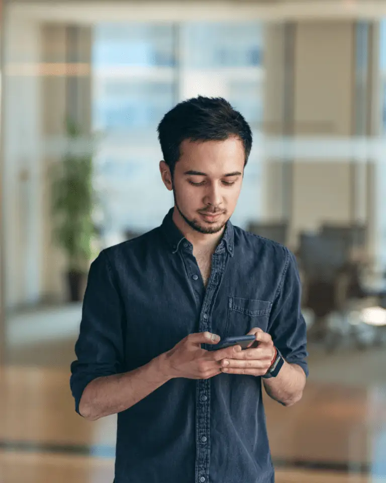 Man typing on phone