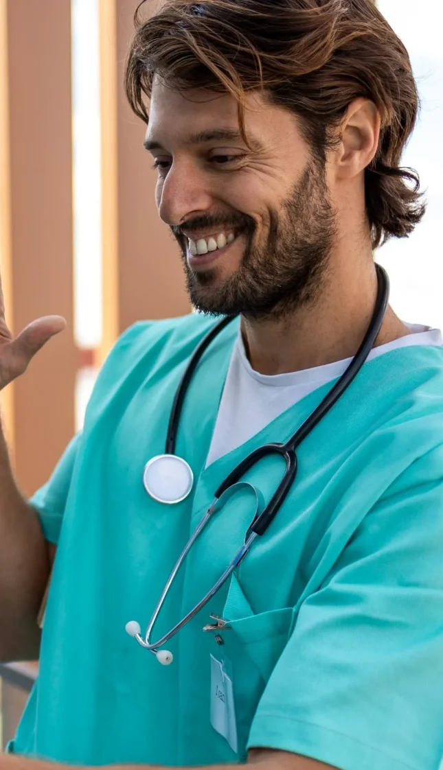 Doctor-Waving-at-Tablet (1)
