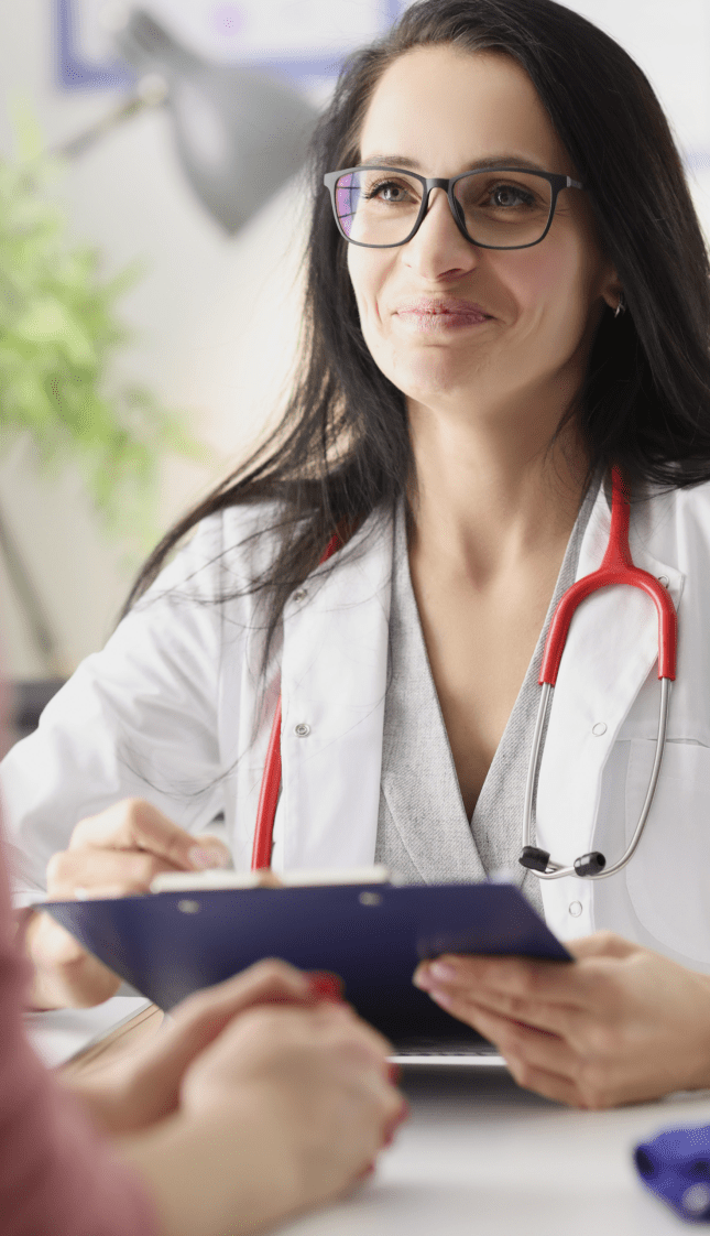female doctor talking to a patient