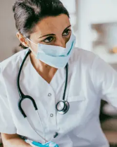 Female nurse wearing a face mask